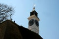 Big Petrovaradin clock tower on the right bank of Danube river i Royalty Free Stock Photo