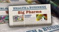 Big Pharma and pharmaceutical business newspaper printing media