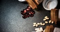 Red Gel Caps and Yellow Pain Pills with Open Pill Bottles all over dark bacground Royalty Free Stock Photo