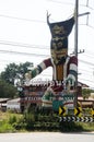 Big Phi Ta Khon figure symbol of Dan Sai with information board Royalty Free Stock Photo