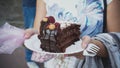 A big piece of chocolate cake at a street food festival