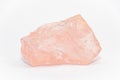 Big piece of rose quartz SiO2 unpolished with uneven shiny surfaces Royalty Free Stock Photo