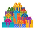 Big pile of christmas gifts in holiday packages with colored paper and bowknots
