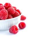 Big Pile of Fresh Raspberries in the White Bowl Isolated on White Background Royalty Free Stock Photo