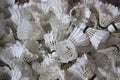 big pile of old broken badminton shuttlecocks. box of spoiled badminton shuttlecocks after the competition for disposal Royalty Free Stock Photo