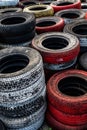 Pile Of Old Used Car And Bike Tyres Representing Hazardous Waste And Material For Recycling Rubber