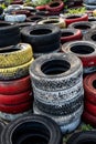 Pile Of Old Used Car And Bike Tyres Representing Hazardous Waste And Material For Recycling Rubber