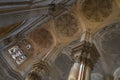 Big pillars, vaults and stained glass windows in Malaga Cathedral, Spain