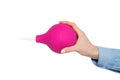 Big pink enema in a female hand. Isolate. Medical item Royalty Free Stock Photo