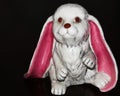 Big pink Floppy eared ceramic bunny for the holidays