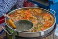 Pot of cooking Vietnamese crab paste noodle soup- Bun Rieu