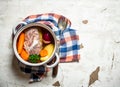 Big pot of soup with meat and fresh vegetables. Royalty Free Stock Photo