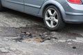 Big pothole caused by freezing and rain in Rome, Italy