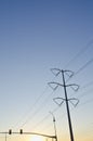 Power cables and street lights in the dry summer sky Royalty Free Stock Photo