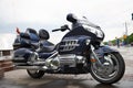 Big powerful luxury travel blue motorcycle