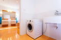 Big practical bathroom with washing machine Royalty Free Stock Photo