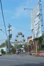 Big promotional billboards plastered on the roadside.