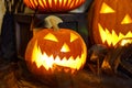 Big pumpkin. Halloween composition of burning pumpkin with bat. Cobwebs branches atmosphere