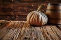 Big pumpkin and oak barrel in wooden room Royalty Free Stock Photo