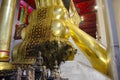 Big reclining buddha statue in ubosot at Wat Phra Non Chakkrasi Worawihan in Singburi city of Sing Buri, Thailand