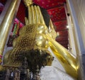 Big reclining buddha statue in ubosot at Wat Phra Non Chakkrasi Worawihan in Singburi city of Sing Buri, Thailand Royalty Free Stock Photo