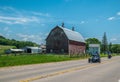 Big red barn along the highway