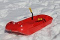 Big red bob to play in the snow in winter Royalty Free Stock Photo