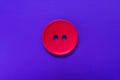 Big red button isolated on a purple background. Royalty Free Stock Photo