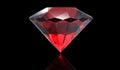 Big red diamond isolated on black background Royalty Free Stock Photo