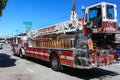 Big red fire engine standing on the road. Big fire truck ready to help in any emergency. Royalty Free Stock Photo