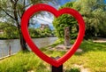 Big red heart shape and Orava castle in village Oravsky Podzamok in Slovakia Royalty Free Stock Photo