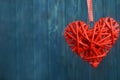 Big red heart wooden blue background for a holiday