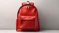 Big red school backpack isolated on gray background, back to school concept, school supplies, promo banner with copy space Royalty Free Stock Photo