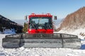 Big Red snowcat on the track Royalty Free Stock Photo