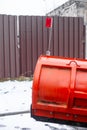 Big red snowplow bucket. Snow removal, road cleaning Royalty Free Stock Photo