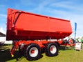 Big red trailer for loading with wheat Royalty Free Stock Photo