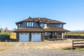 New detached house for sale with gravel driveway and no landscaping Royalty Free Stock Photo