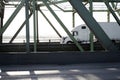Big rig long haul semi truck running on the bridge in sunshine Royalty Free Stock Photo
