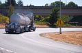 Big rig semi truck with tank semi trailer for the transport of c Royalty Free Stock Photo