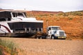 Big rig semi truck transporting huge houseboat on semi trailer in desert of Arizona Lake Powell resort