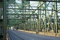 Big rigs semi trucks convoy driving on Columbia Interstate lift Royalty Free Stock Photo