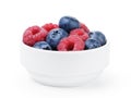 Big ripe blueberries and raspberries in white bowl Royalty Free Stock Photo