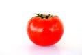 Big ripe red tomato on a white background