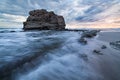 Big rock beach sunset long exposure Royalty Free Stock Photo