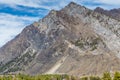 Big rock cliff against blue sky Royalty Free Stock Photo