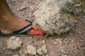 A big rock fall over the man`s foot. Royalty Free Stock Photo