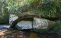 Big rock over the waterway. Royalty Free Stock Photo