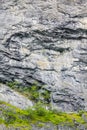 Big rocks cliffs texture with trees in Norway