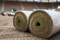 Big rolls of grass lays on a football field Royalty Free Stock Photo