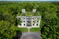 Big ruin house covered ivy and surrounded by a forest , Moore Hall is located in county Mayo Ireland Royalty Free Stock Photo